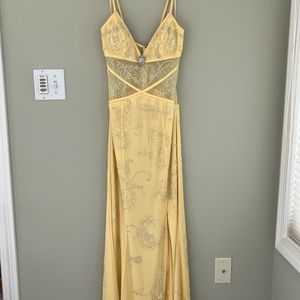 Yellow floor length gown with beads
